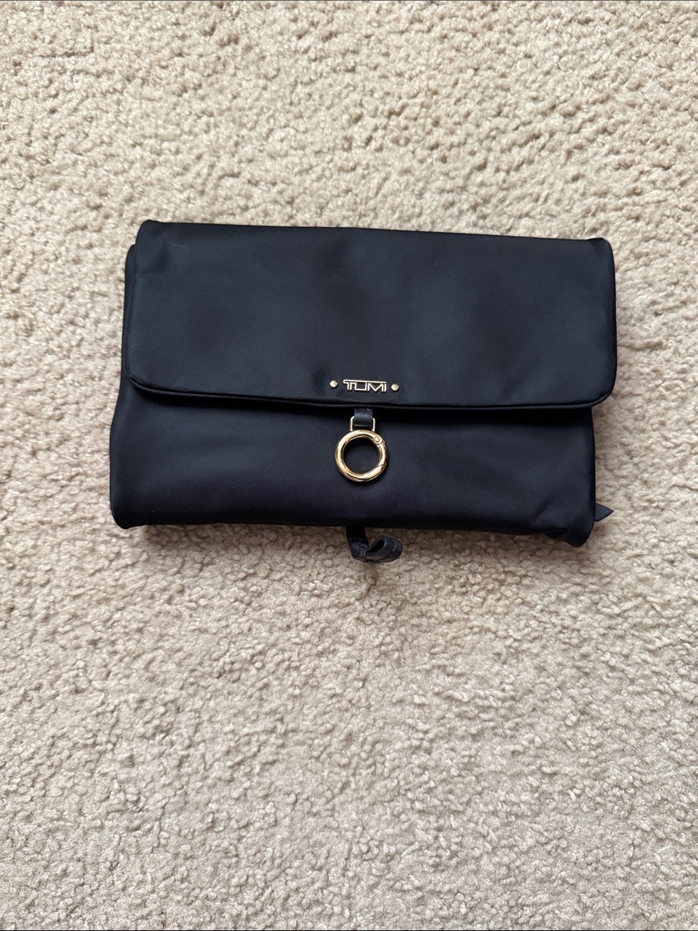 Tumi Black Fold-Over travel jewelry organizer with Gold Ring closure